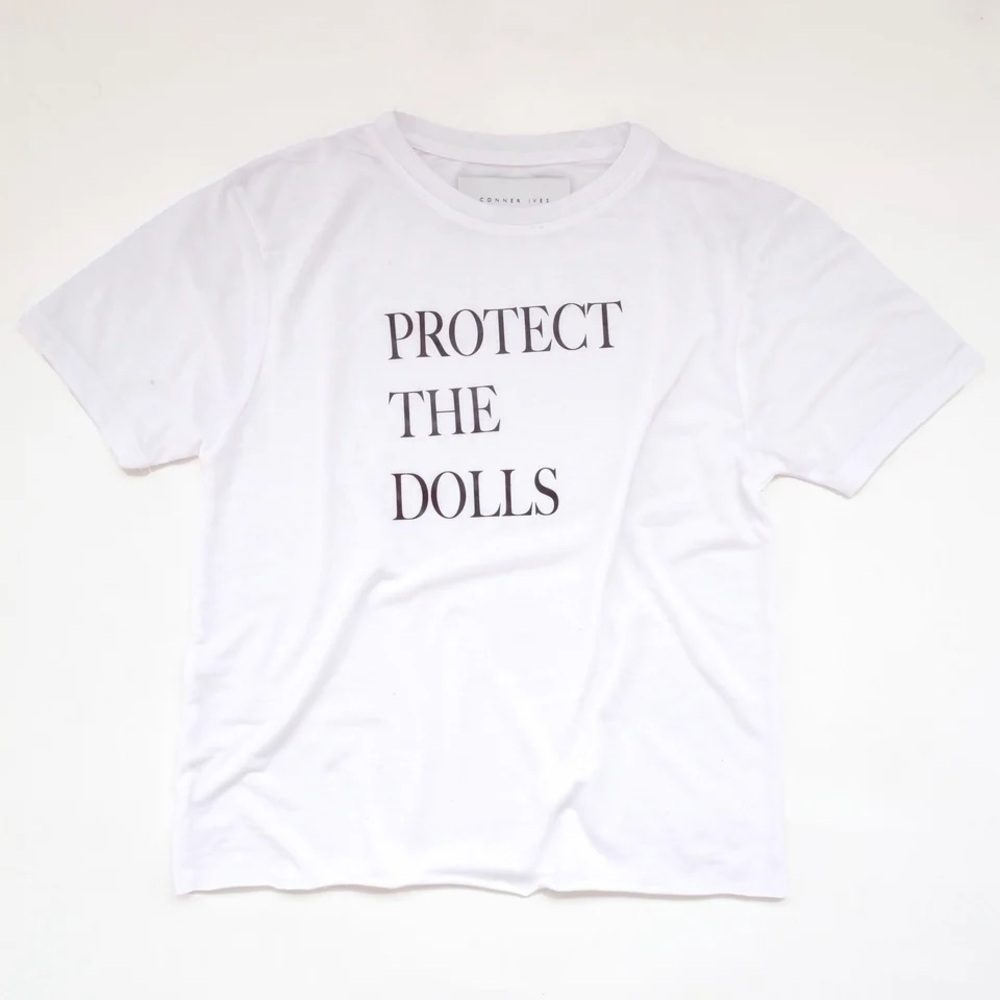 White Short Sleeve Tee with 'Protect The Dolls' Print